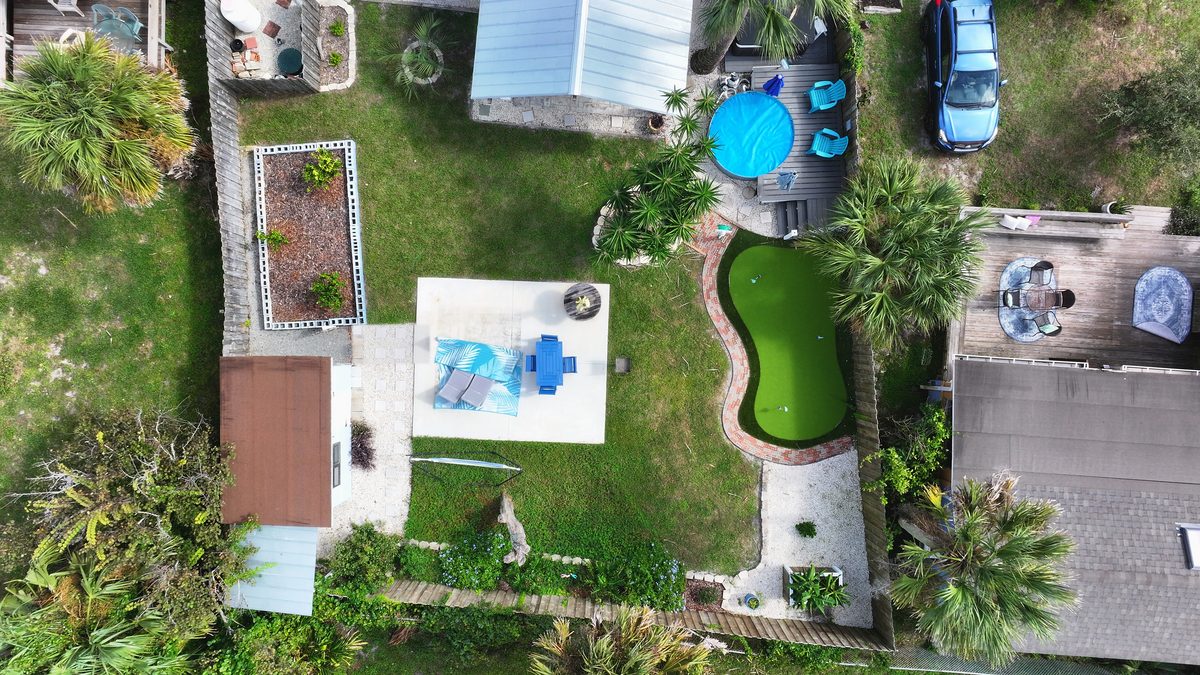 Drone aerial photograph looking down on a Florida property and surrounding land, used to illustrate the Ground to Grid drone mapping course