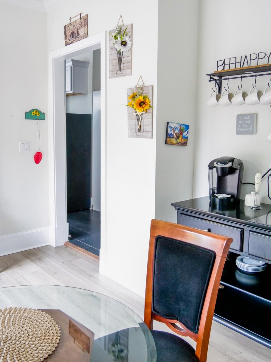 Furnished dining nook with a coffee bar — the lived-in feel virtual staging gives a vacant room